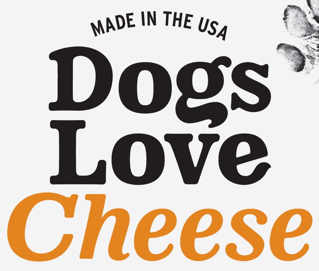 Close up of Dogs Love Us cheese treat package with the phrase "Made in the USA" and an inked paw print in the background.