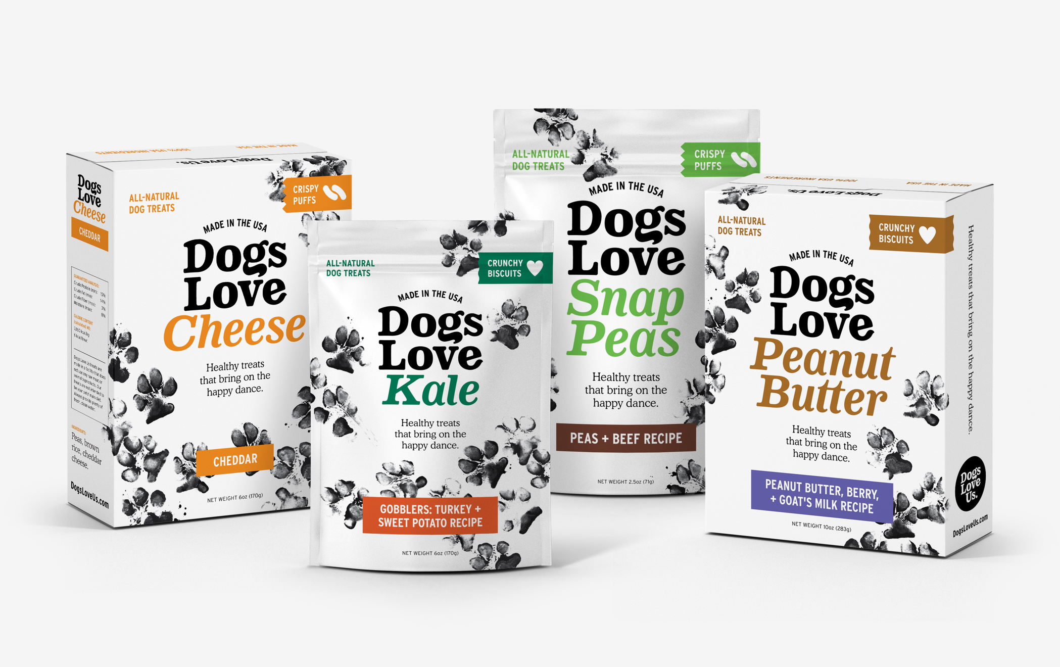Four packages of Dogs Love Us treats, including cheese, kale, snap peas, and peanut butter flavors.