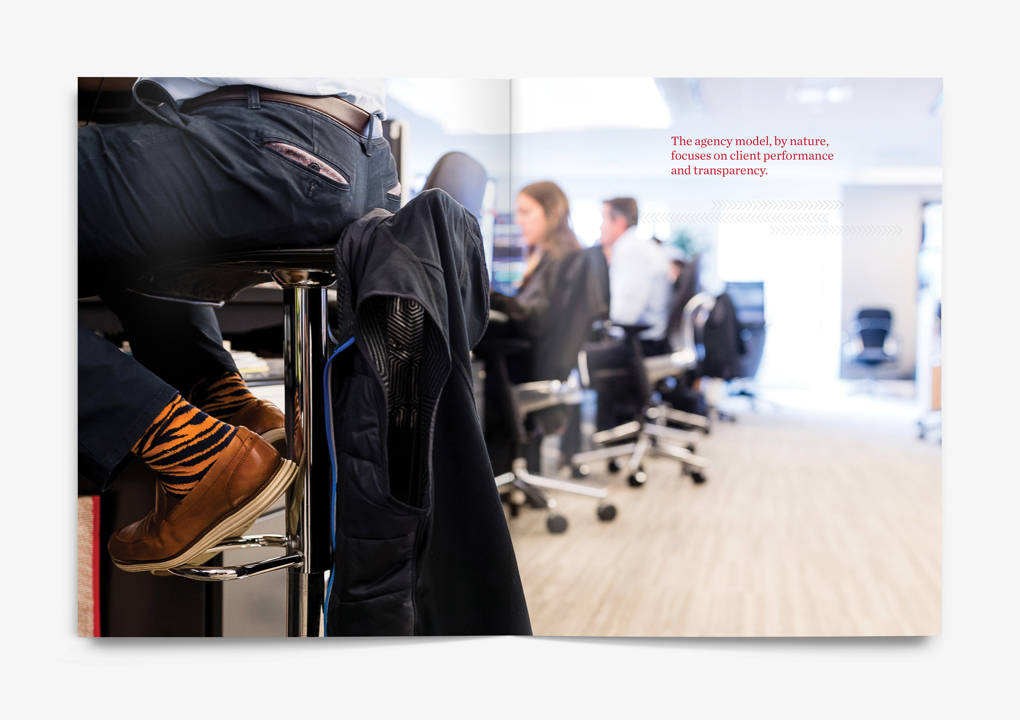 A scene for the Instinet office in New York; a row of traders at the workstation viewed from a low angle.