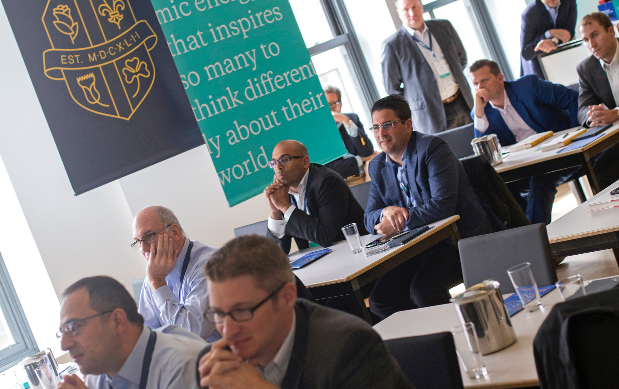 Attendees pay rapt attention to a presentation at the 2017 KCG Uncon client event.