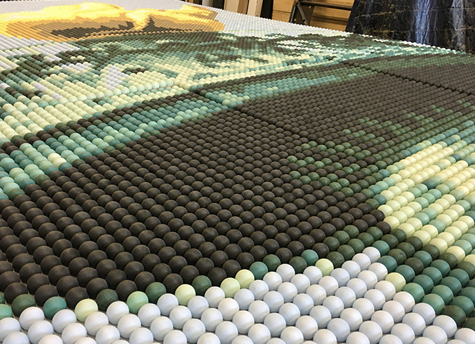 Close shot of the KCG life-size Statue of Liberty ping pong ball mural showing it's construction.
