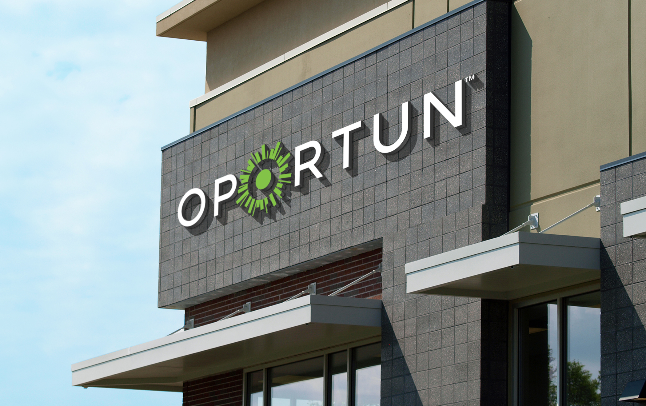 The Oportun logo on the large exterior sign on the company's headquarters.