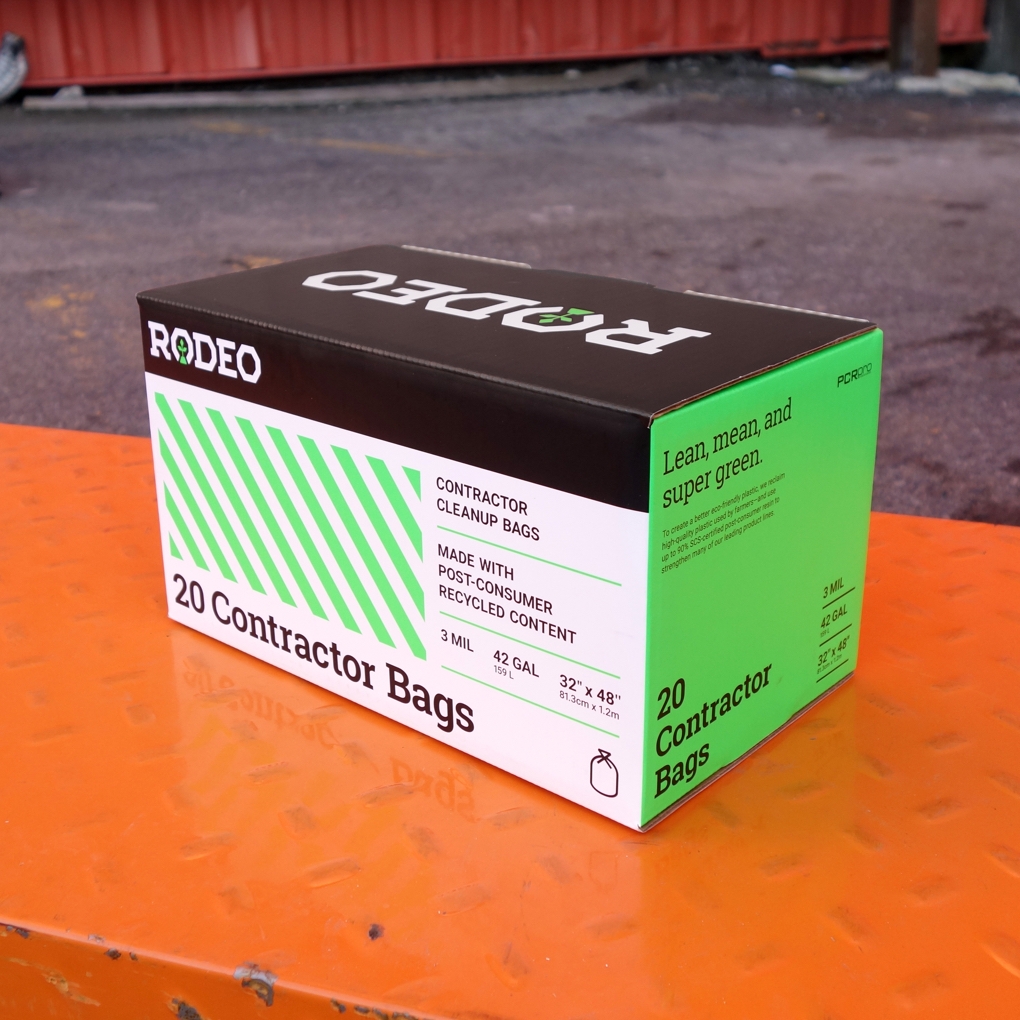 Front and side view of a Rodeo Plastics 20 contractor bag package imprinted with the phrase "Lean, mean, and super green."