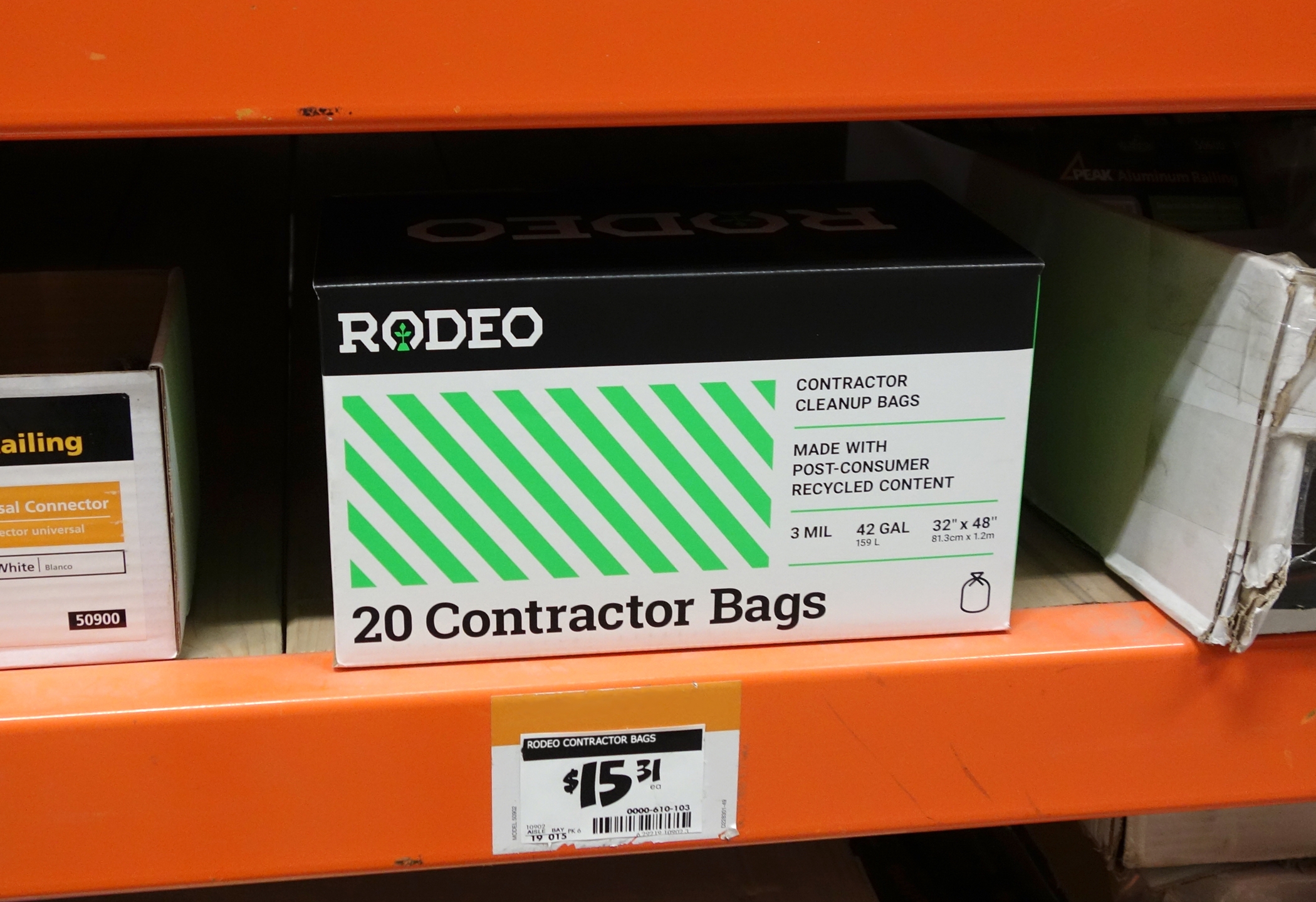 Front view of a Rodeo Plastics 20 contractor bag package on a shelf in a big-box retail store.