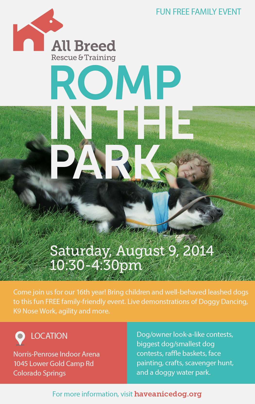 A poster for the All Breed Rescue and Training "A romp in the park" event with a boy and his dog wrestling in the grass.