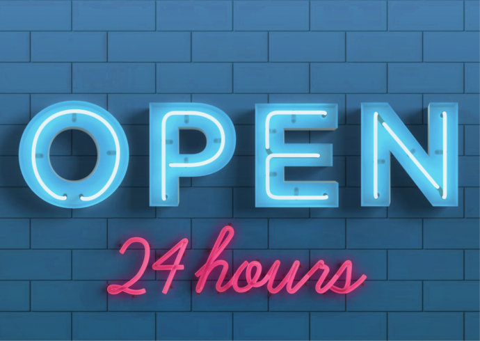 Neon sign that reads “Open 24 hours.”