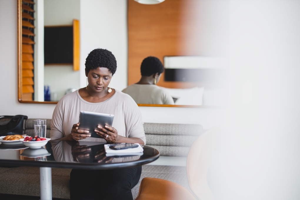 Woman reading from tablet