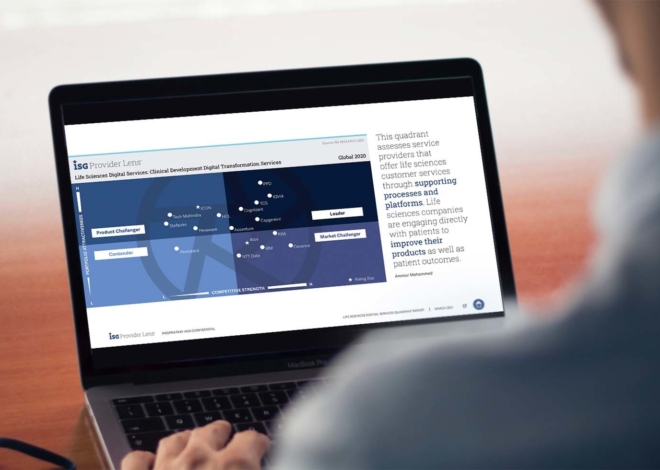 A laptop with an image of an ISG Providers Lens Quadrant page showing text and relative data on several technology services providers.