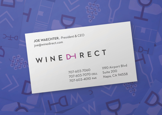 Wine Direct business card with President & CEO Joe Waechter's contact information on a purple backdrop of brand icons.